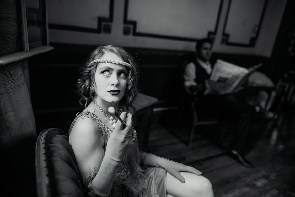 Elegant black and white vintage fashion portrait in a stylish Buenos Aires lounge.