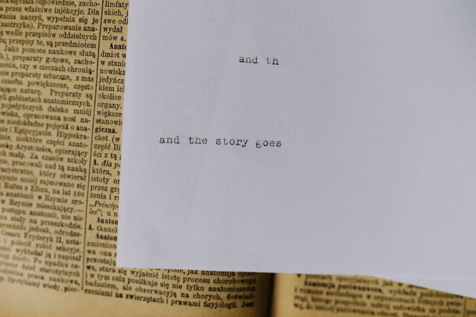 A piece of paper with typewritten text 'and the story goes' over an old book page.