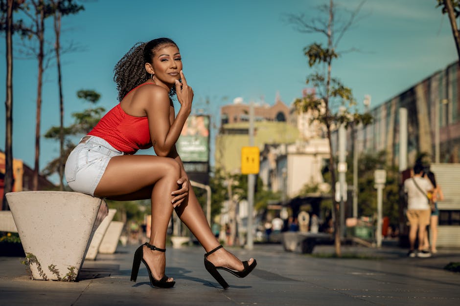 Stylish urban portrait of a young woman in Rio de Janeiro, capturing vibrant city life.